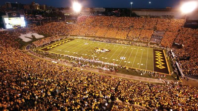 Memorial Stadium filled with black and gold fans