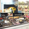 A makeup display area holds different products