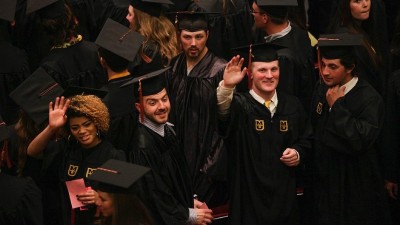 Group of students in caps and gowns.