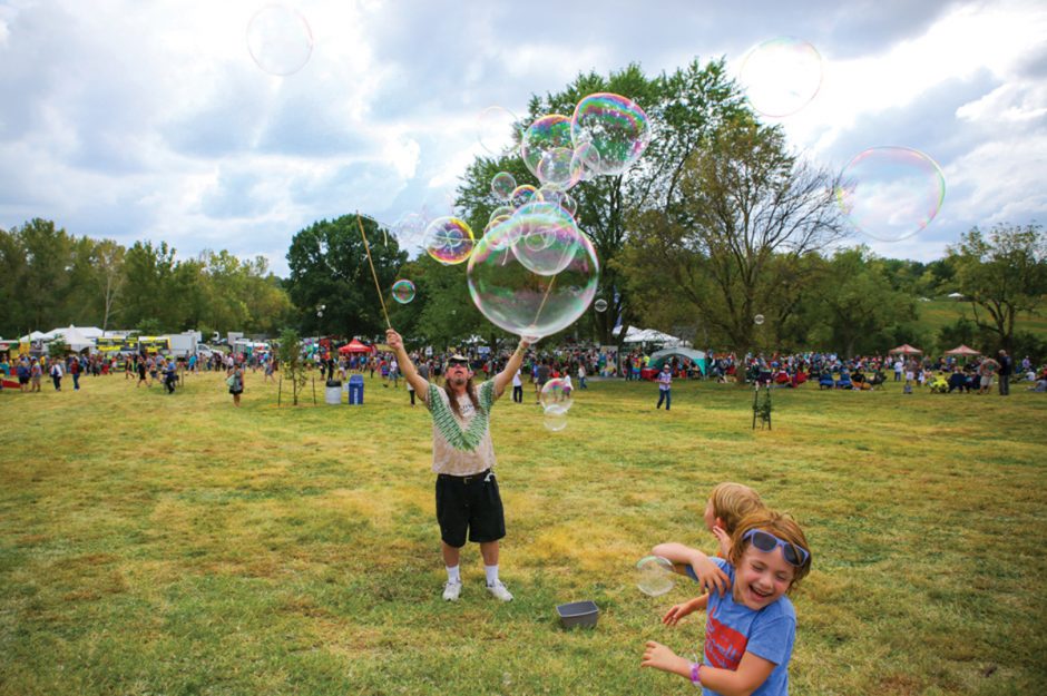 Man making giant bubbles at the Roots N Blues N BBQ festival
