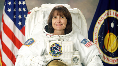 Linda Godwin in a space suit.