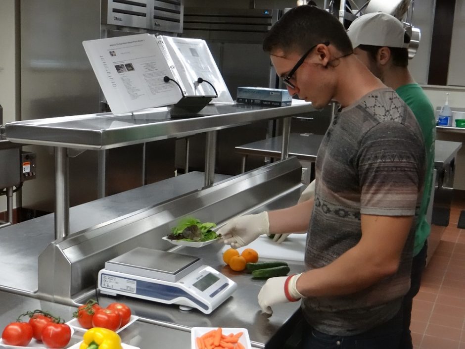This is a picture of ramiro Arreola working in the MU dietetics lab