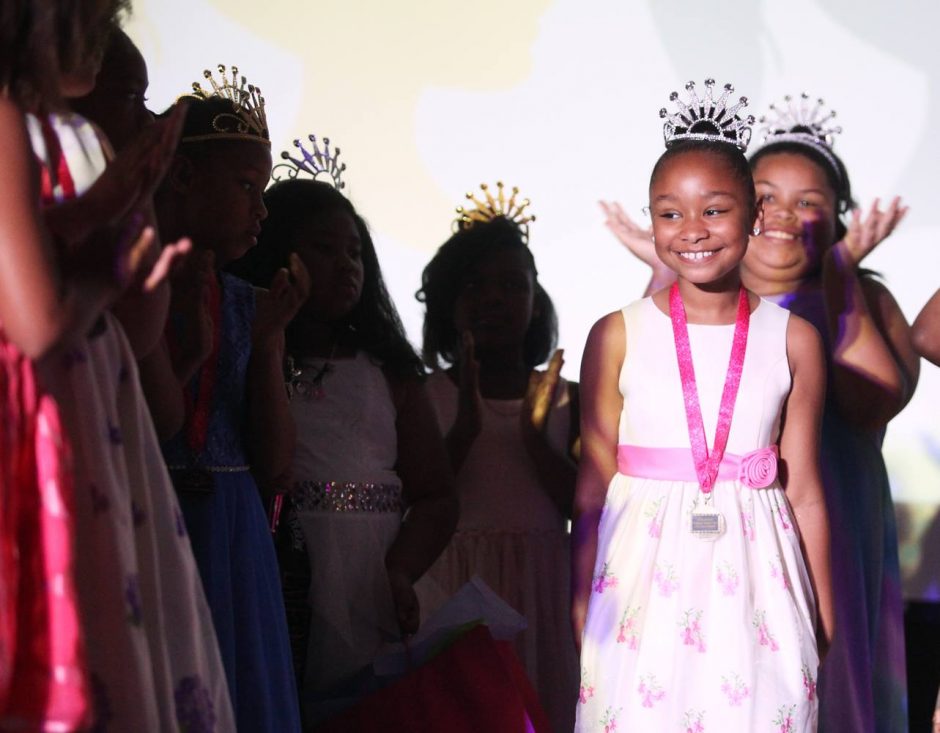 Aleena Simmons smiles as she is announced the third annual Little Miss Elite.