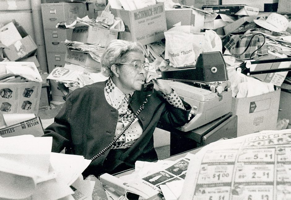 In this Missourian archives file photo from Feb. 1, 1989, Lucile Bluford answers phones while working at the Kansas City Call.