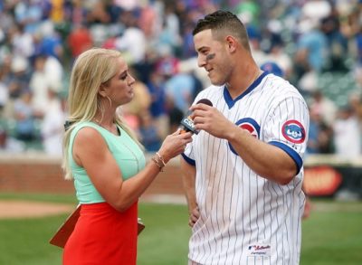 This is a picture of Kelly Crull interviewing Anthony Rizzo of the Chicago Cubs