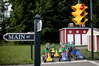 children driving carts