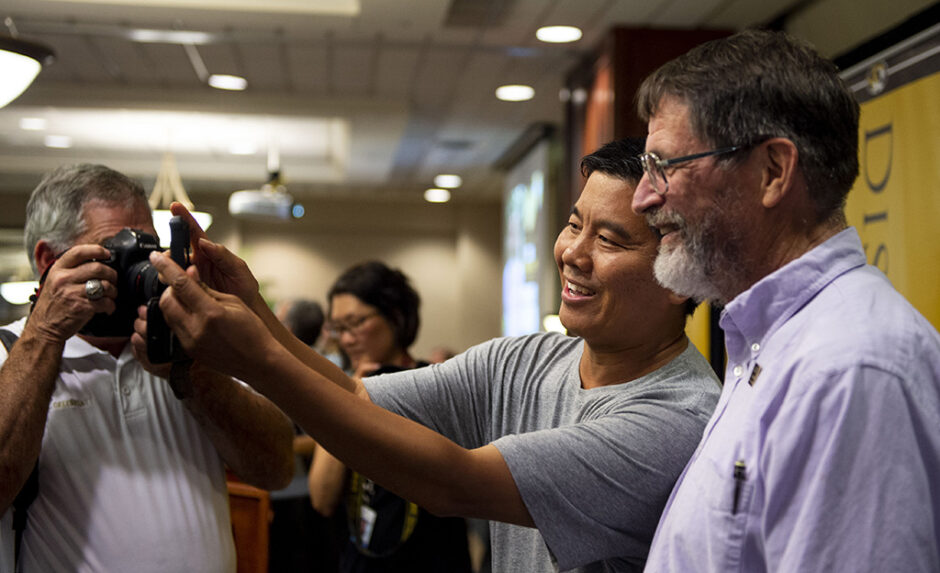 Dr. Smith smiles for a selfie with one of his many fans.