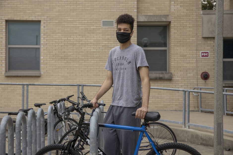 Abdullah Syed, a Biology and Psychology double major from Anna Arbor, Michigan with his bicycle outside Aug. 15, 2020. Sam O'Keefe/University of Missouri