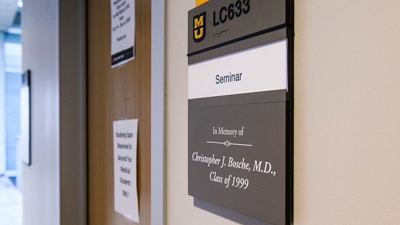 Donor plaque in memory of Christopher Bosche, MD, outside of LC633 in the Patient-Centered Care Learning Center.