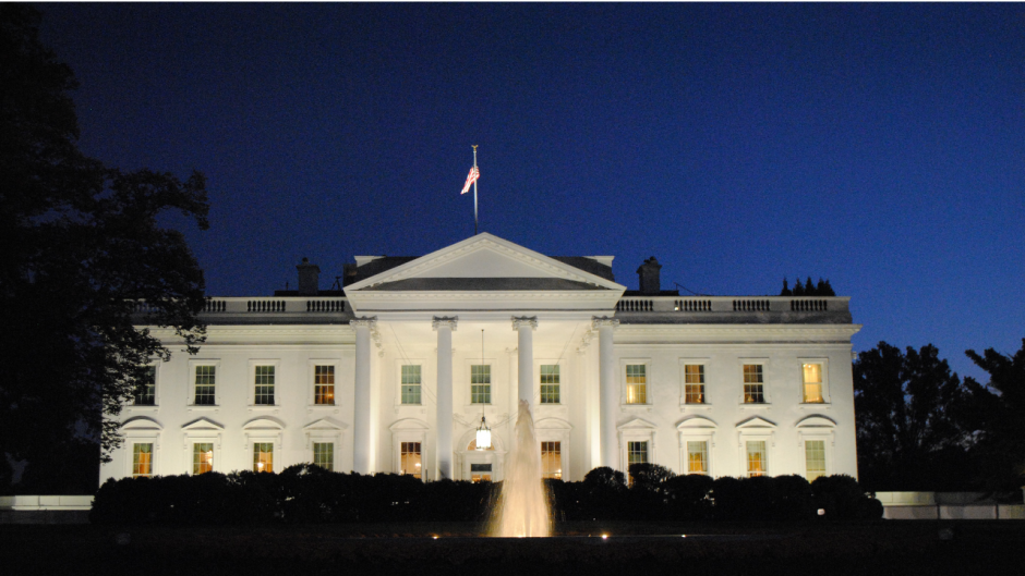 A picture of the White House at night