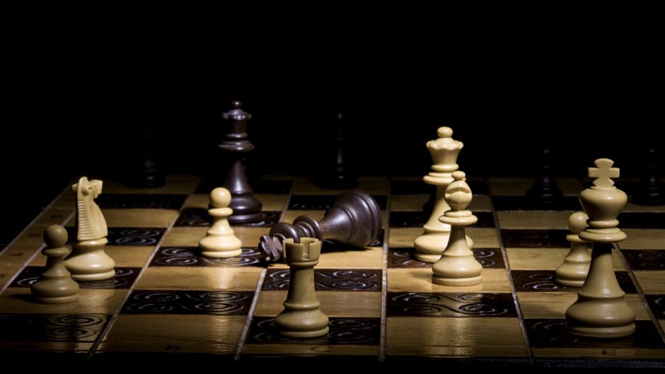 picture of chess pieces on a chess board