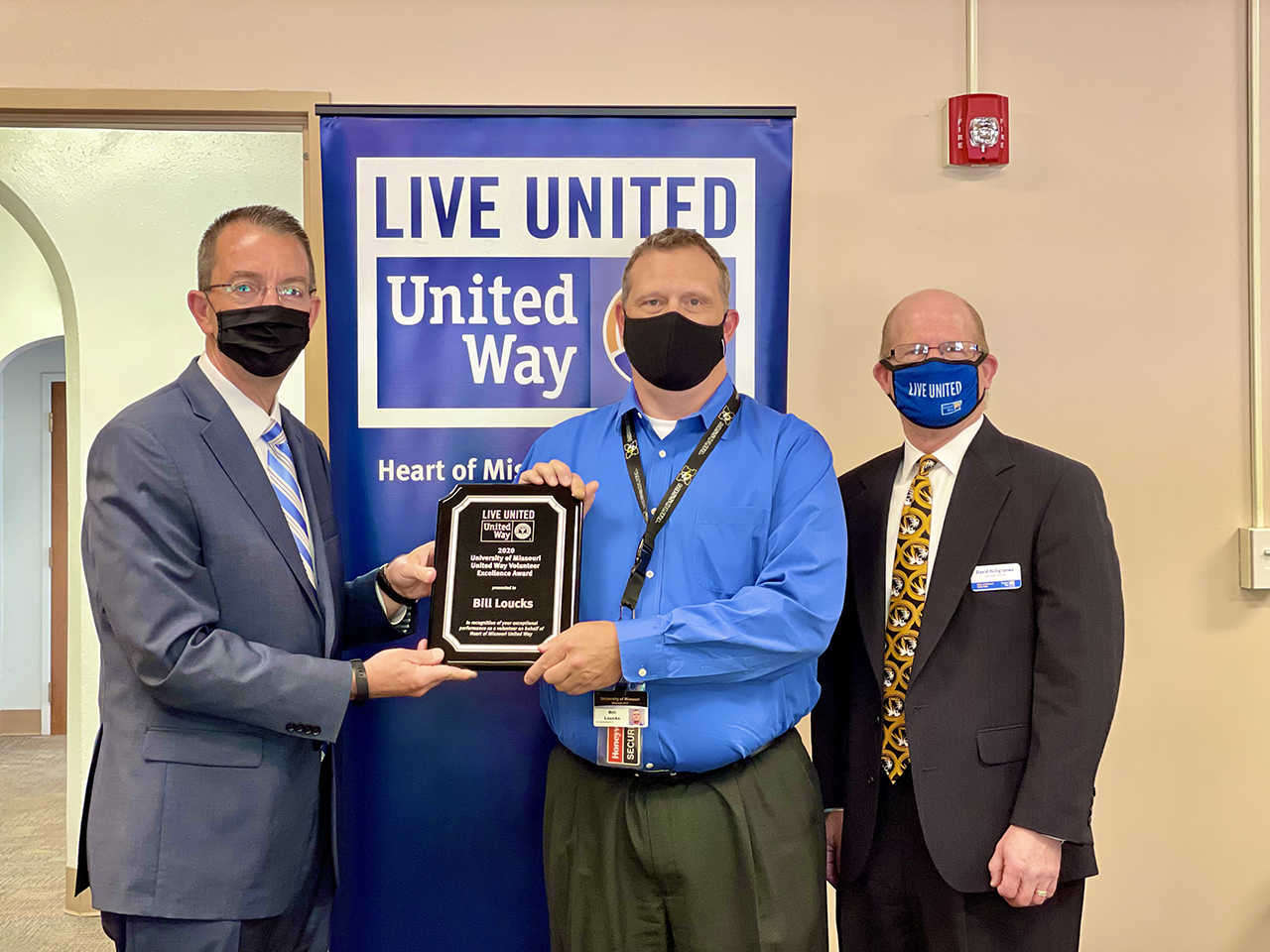 Bill Loucks receives the MU United Way Volunteer Excellence Award.