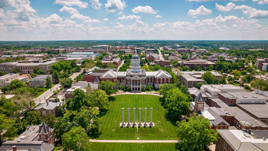 drone shot of jesse hall and the quad during summer