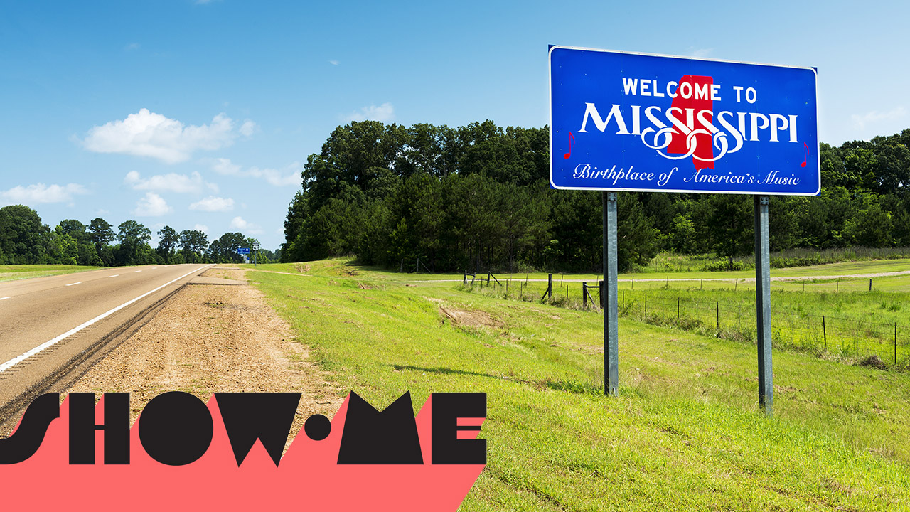 "welcome to mississippi" sign on a beautiful sunny day