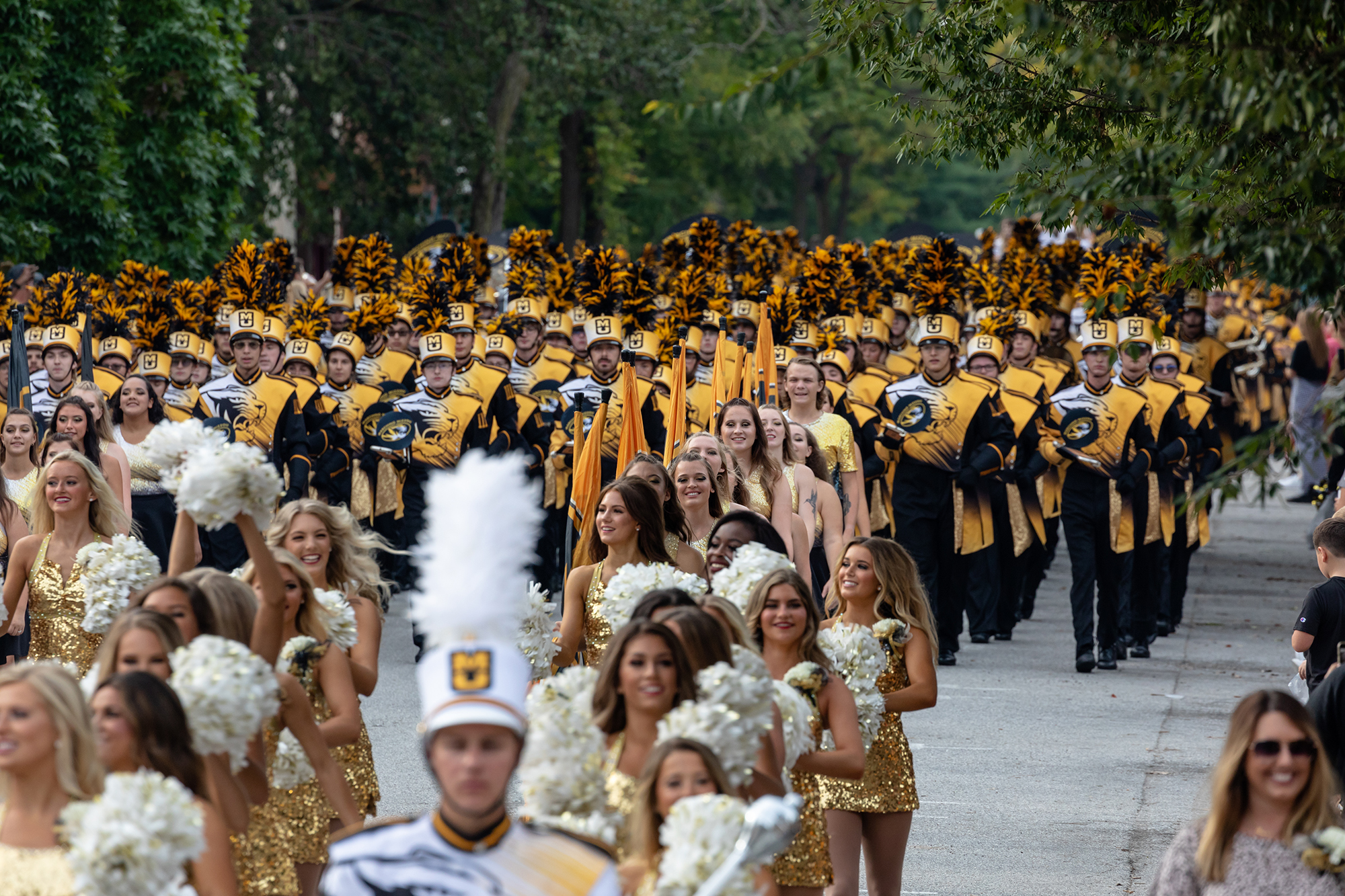 marching mizzou and the golden girls fill the streets during the parade