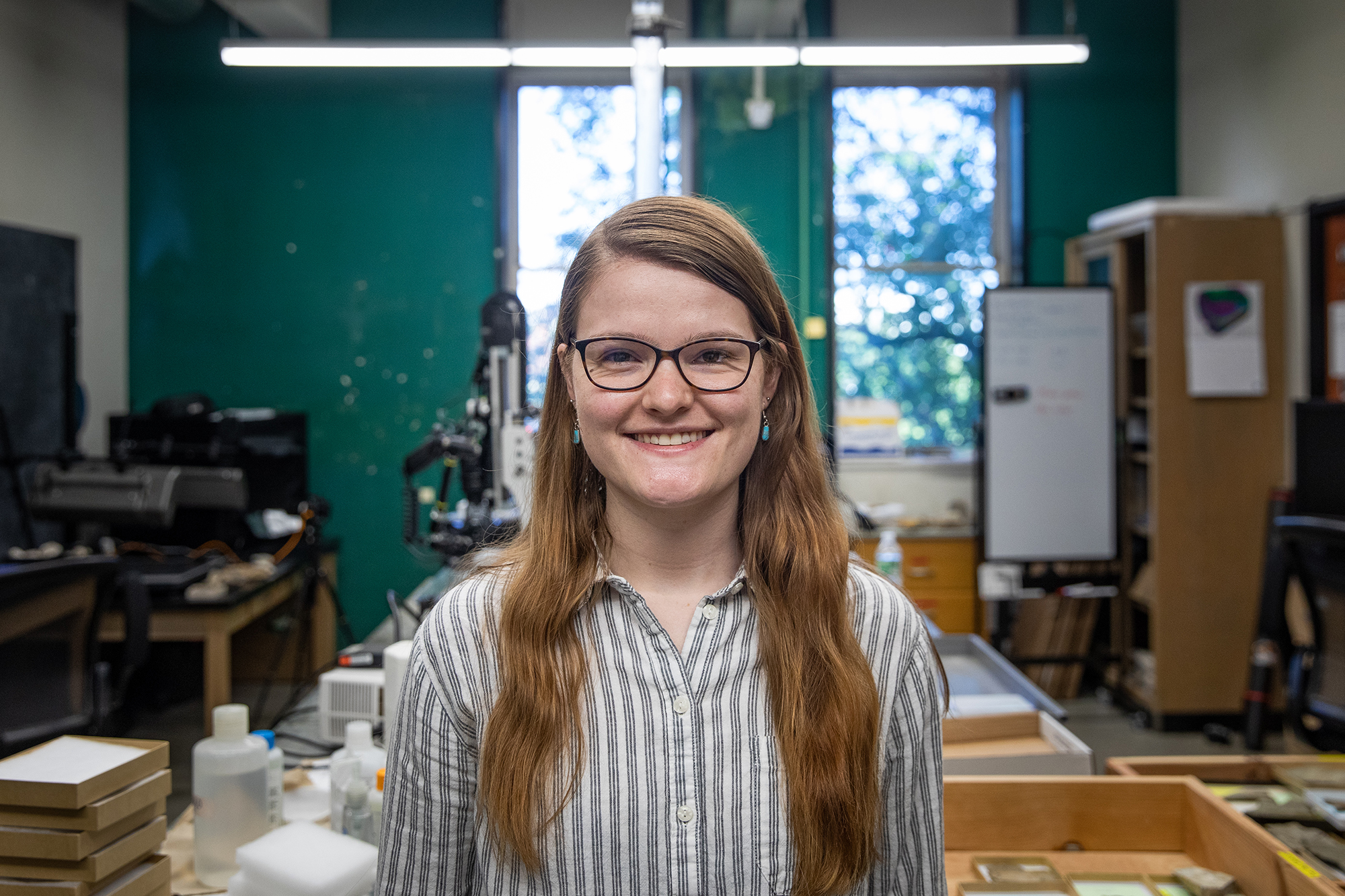 portrait of graduate student mikaela pulsipher in a lab