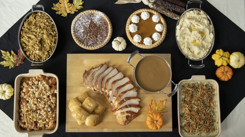 photo of a thanksgiving meal spread out on a table