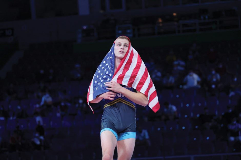 Rocky Elam holding American flag