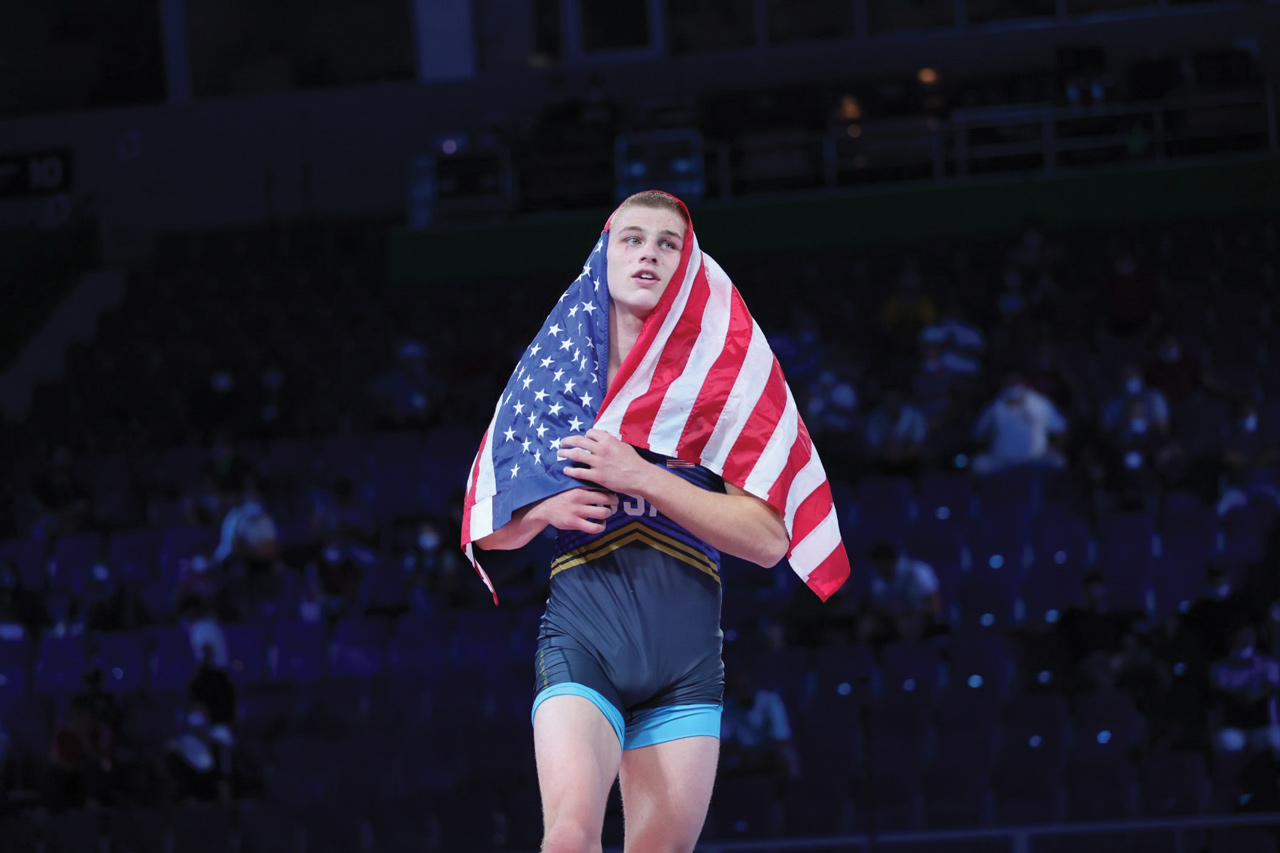 Rocky Elam holding American flag