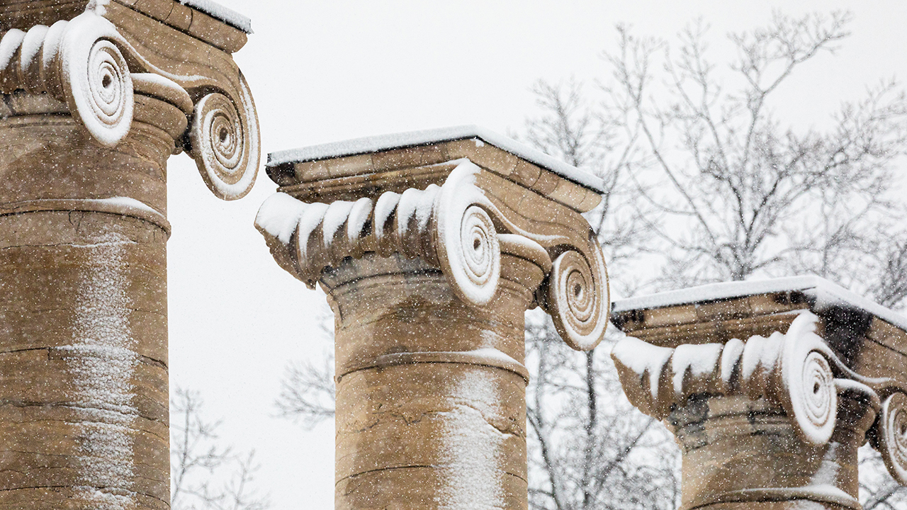 close-up of the top of the columns covered in snow