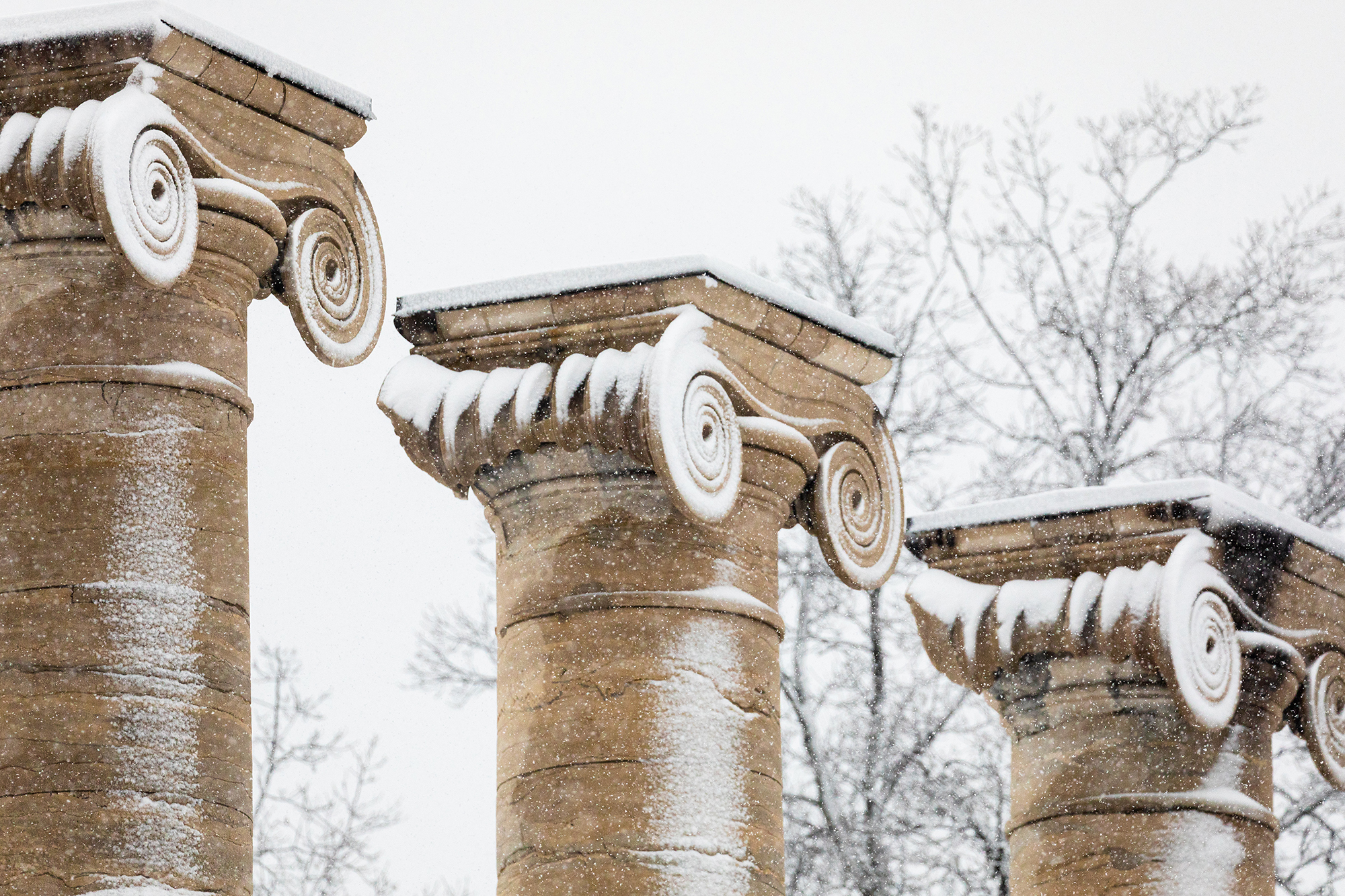 close-up of the top of the columns covered in snow