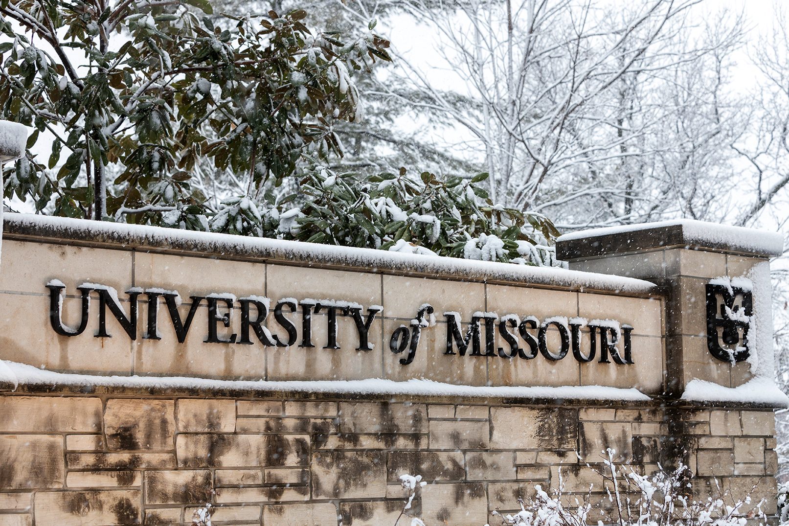 university of missouri sign covered in snow
