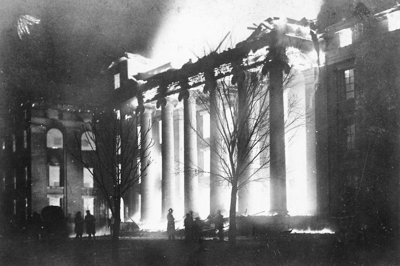 a historic photo of academic hall burning