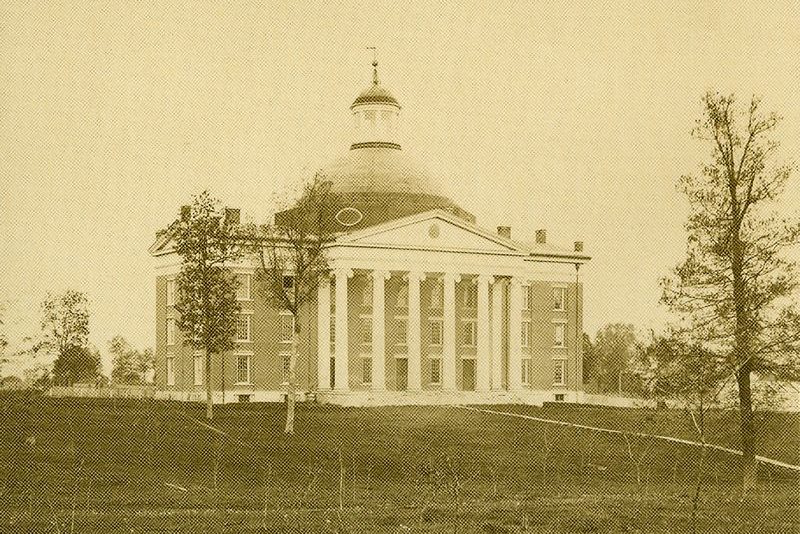 a historic photo of academic hall