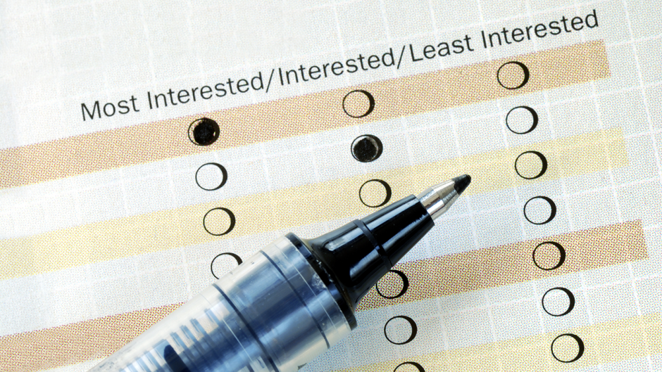 Picture of a pen on a survey paper source shutterstock