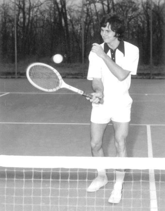 black and white photo of Steve Owens playing tennis