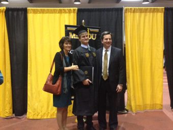 Steve Owens with his wife and son at graduation