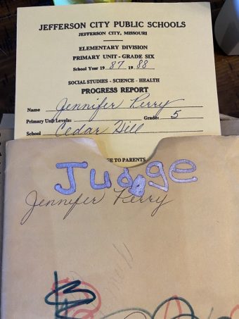 a grade card from 1987/1988 that has "judge jenny" written over it
