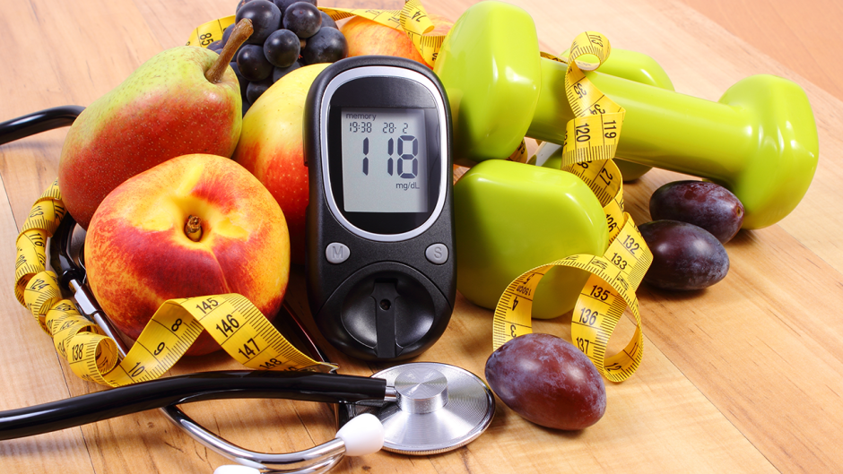 Picture of a blood glucose meter with fruit, barbells source: shutterstock