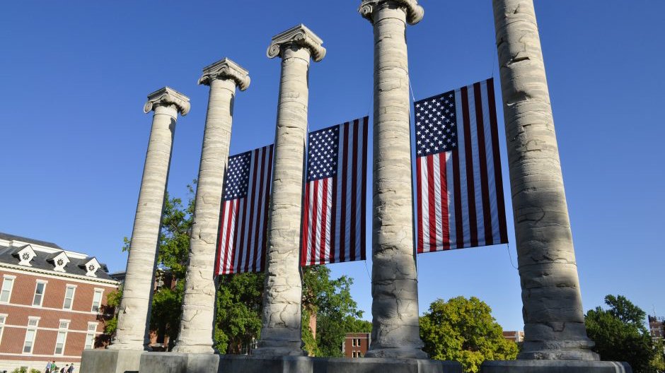 columns with flags on them