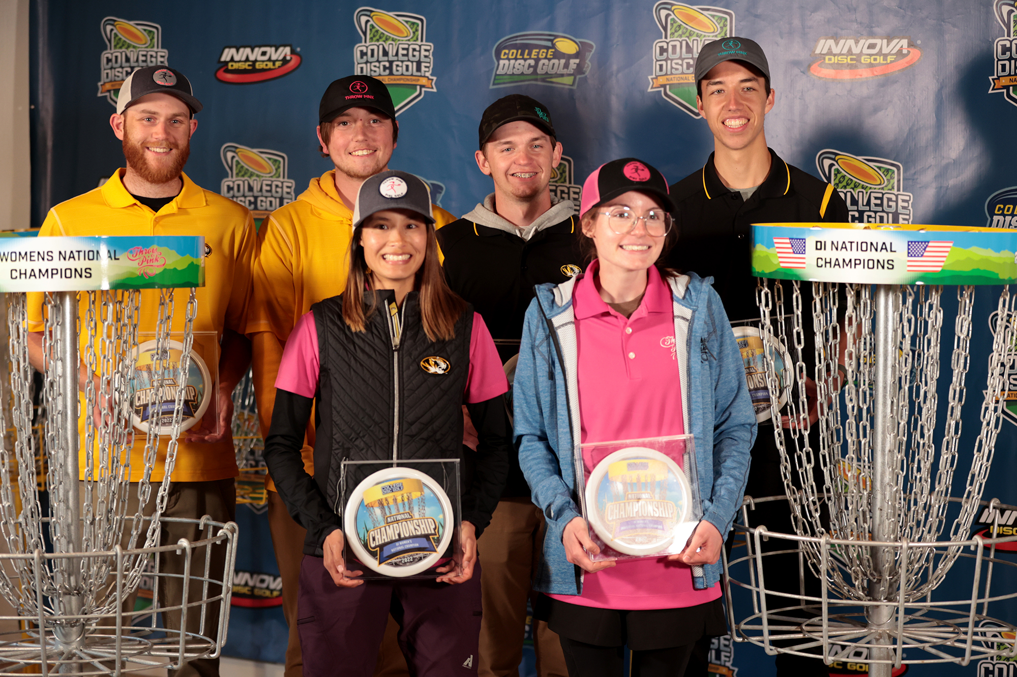 six mizzou disc golf players pose with their trophies