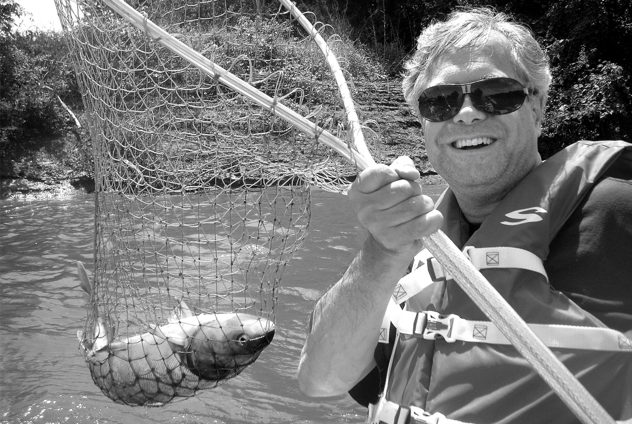 Mark Morgan with carp in net