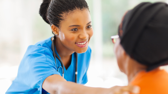 This is a photo of a nurse with a patient.