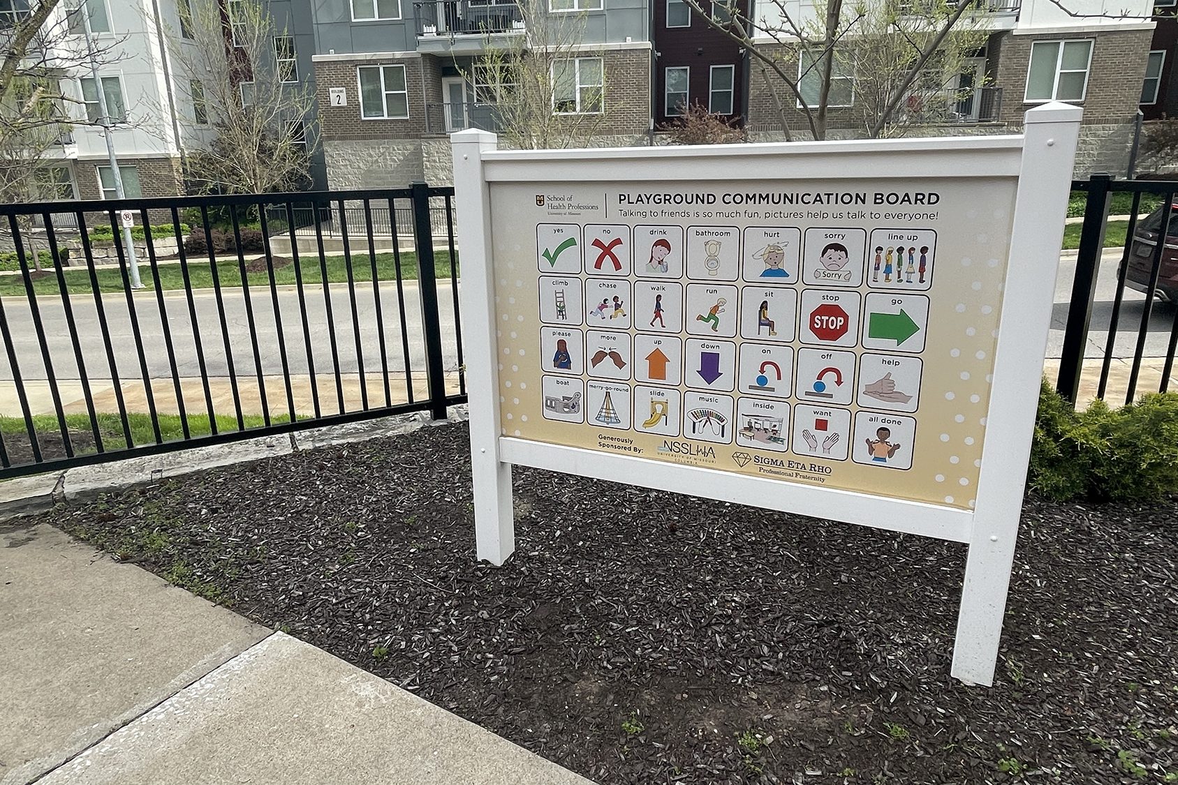 a communication board on the inclusive playground