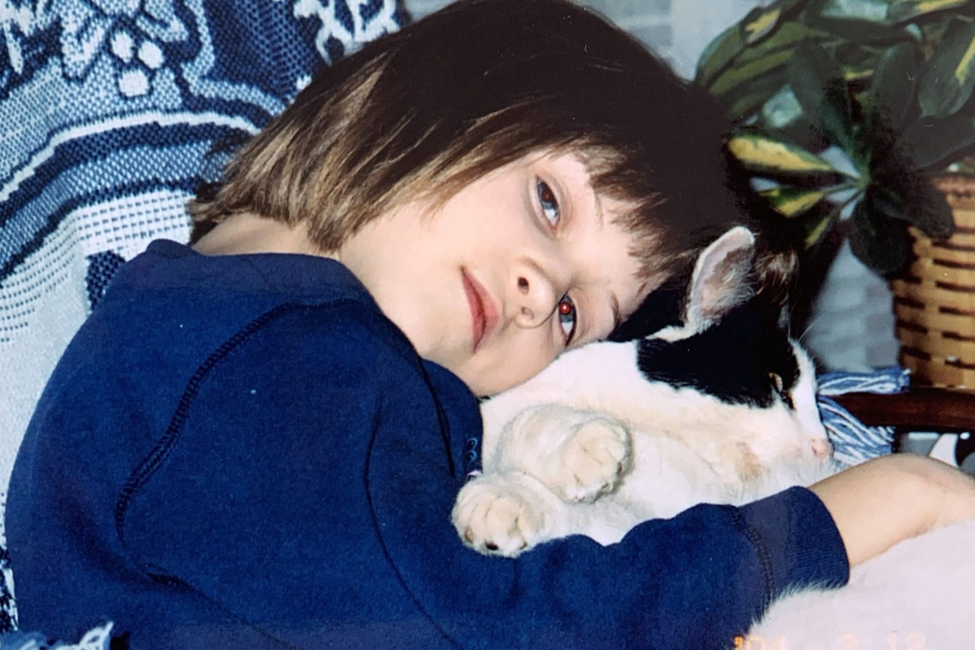 Libby Martin snuggles cat