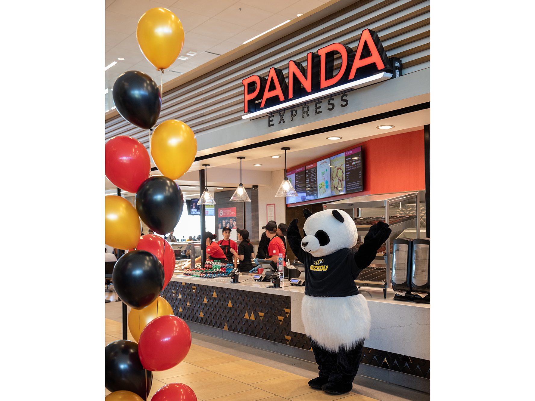 a panda in front of panda express