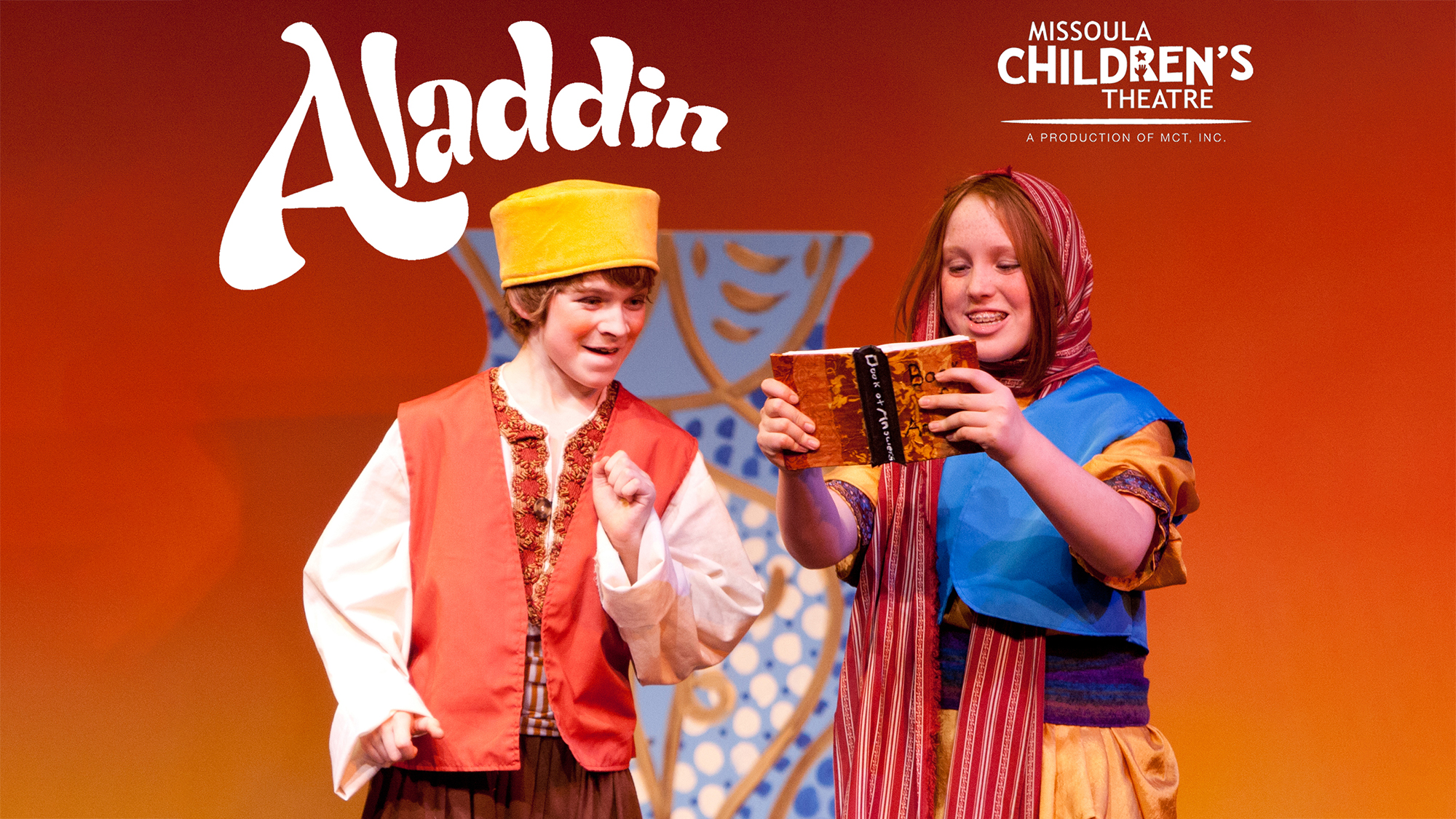 two children perform in aladdin