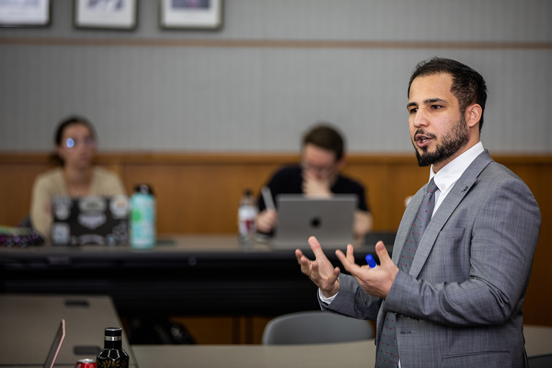Law professor Zarif Darkhily lectures to students in a classroom
