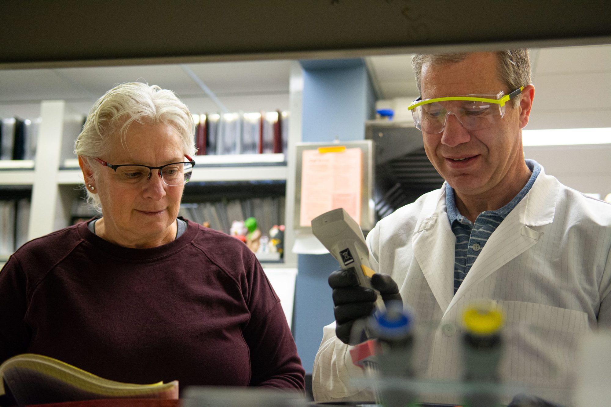 Leslie A. Lyon a feline geneticist and Gilbreath-McLorn endowed professor of comparative medicine in the MU College of Veterinary Medicine, and Thomas Juba. a senior research specialist, prepare to test a sample of cat DNA. 