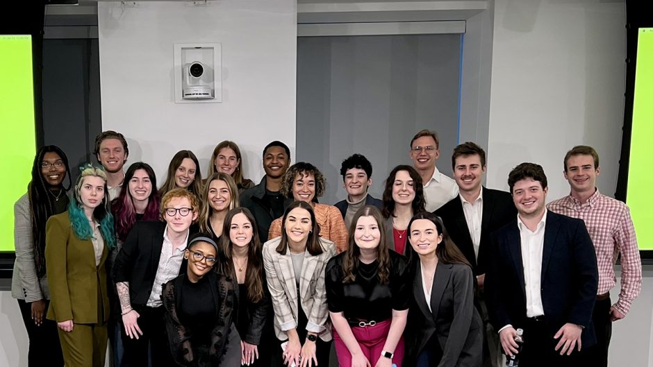 a group of journalism students pose for a group photo