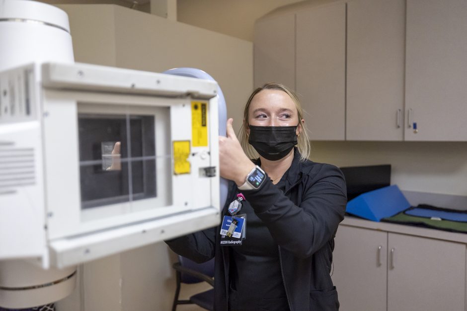 a girl using an x-ray machine