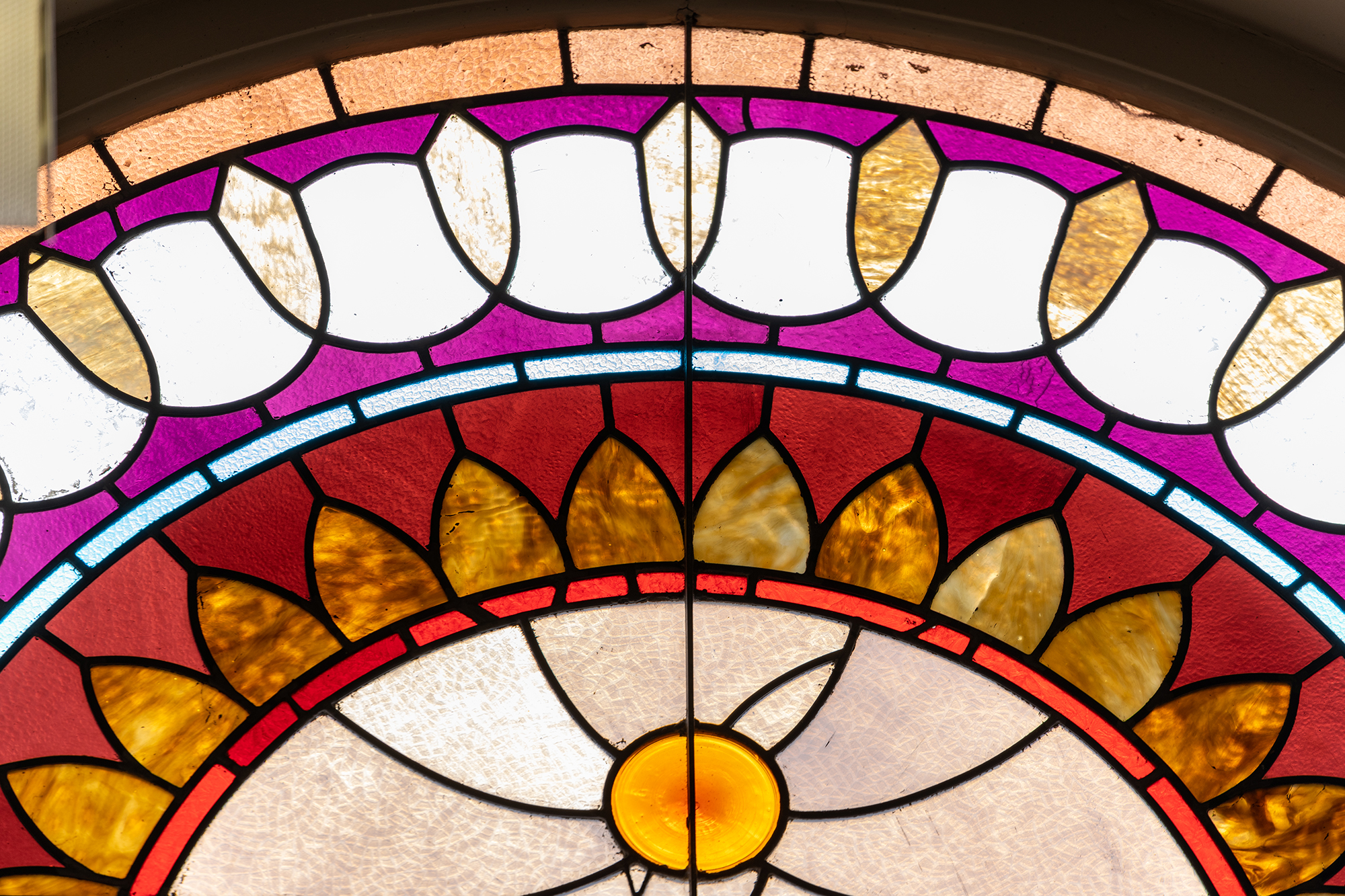 close up of a colorful stained glass window