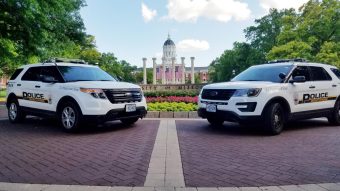 Two MUPD vehicles in front of the Columns.