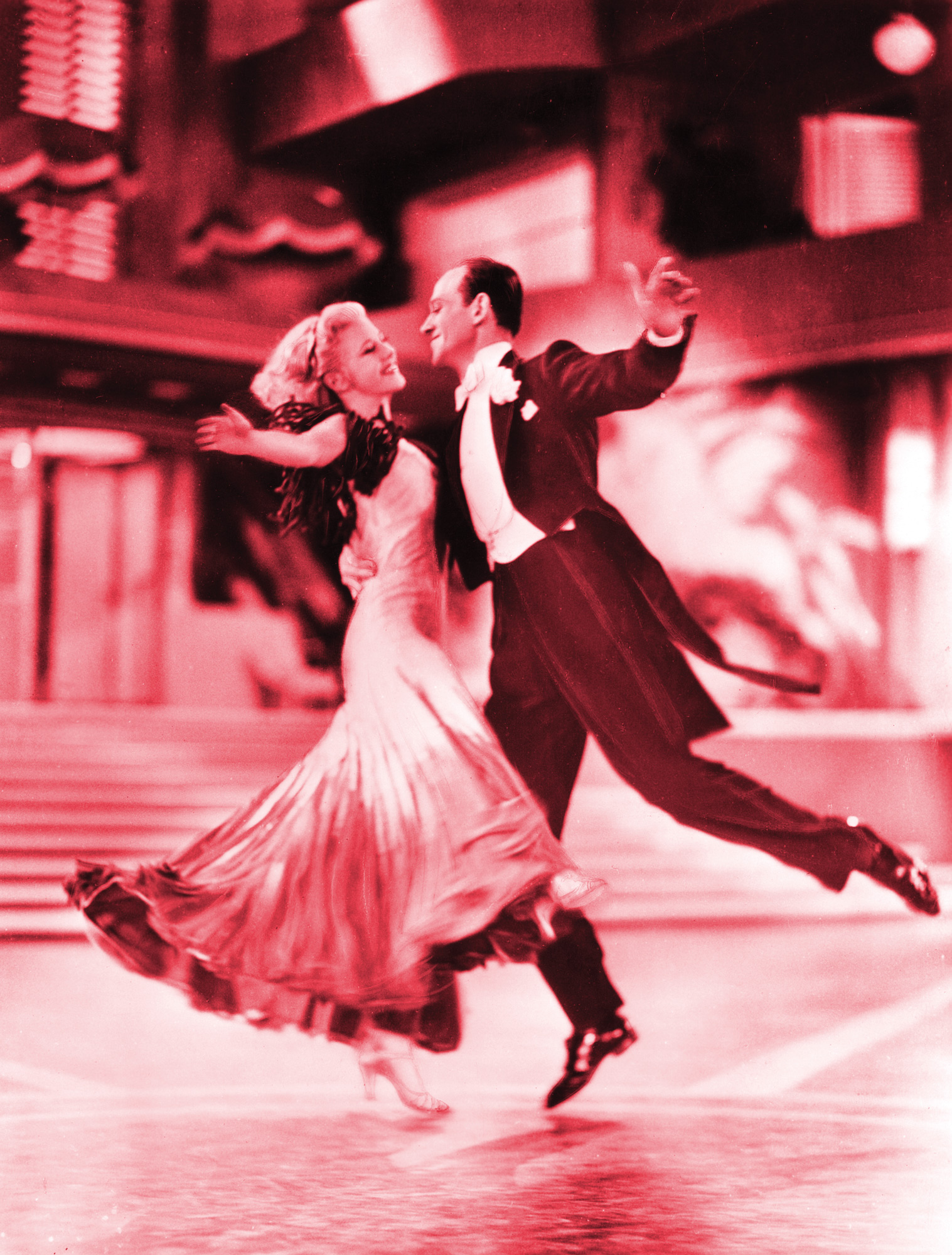 Man and woman dancing on set