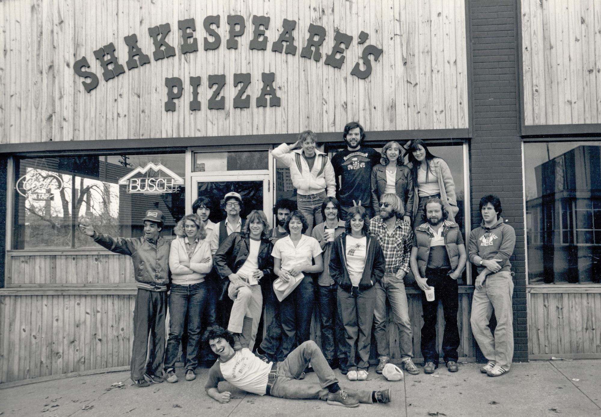group photo of pizza workers
