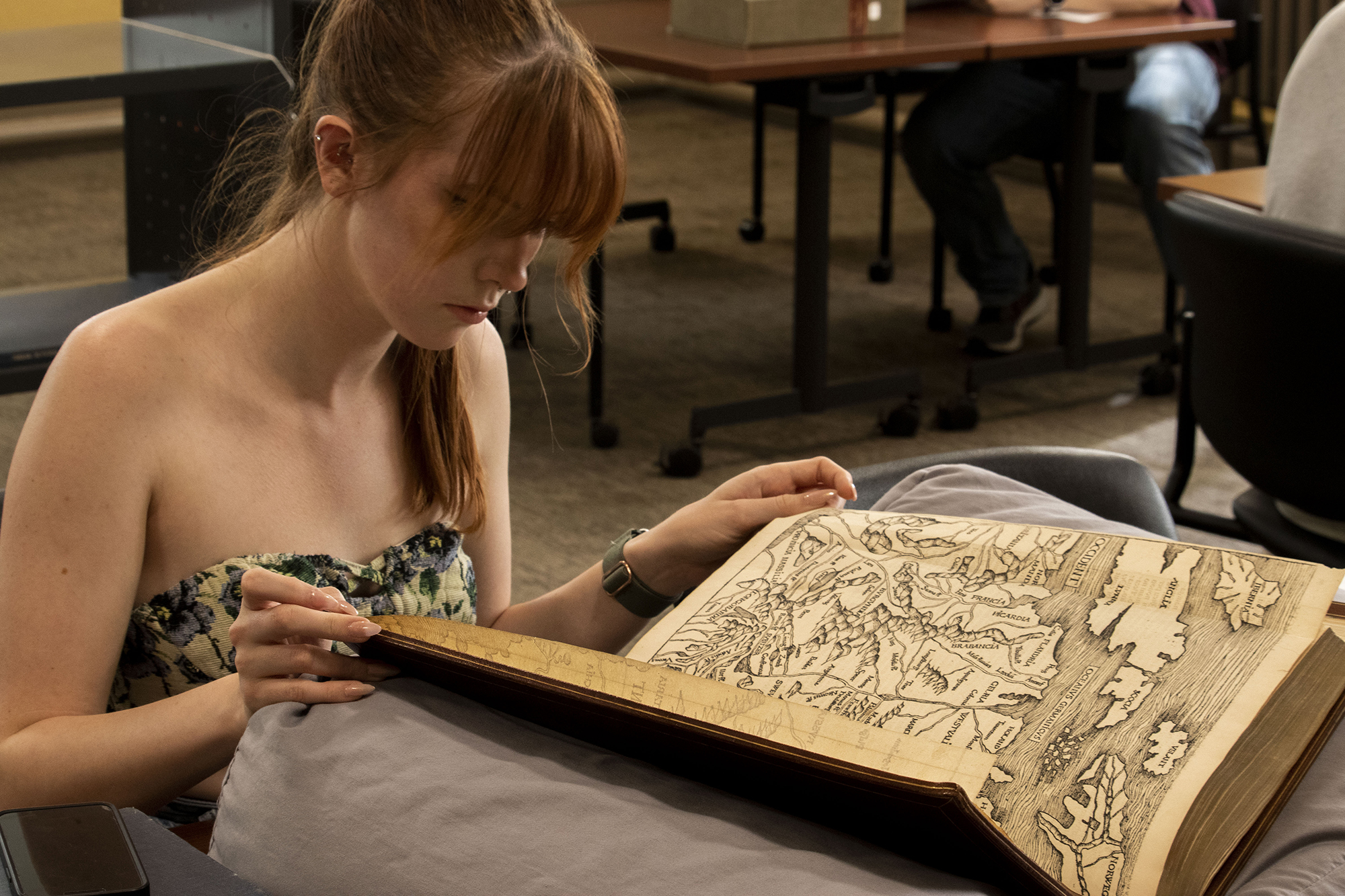 A student explores a manuscript.